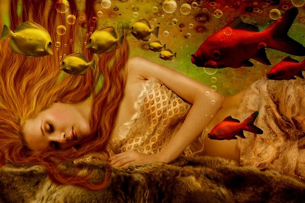 Sirène aux cheveux roux sous l eau avec des poissons
