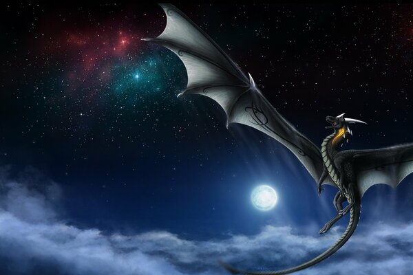 A winged dragon in the clouds of the night sky