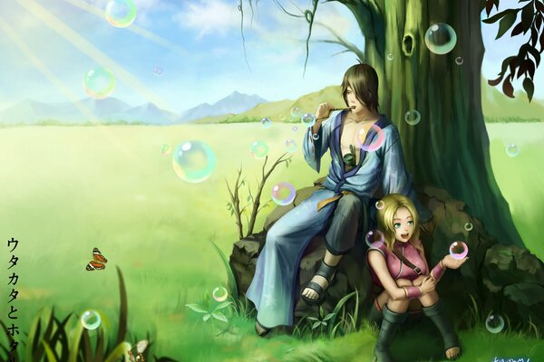 Couple near a tree with soap bubbles