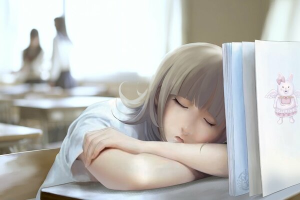 Chica dormida en el Escritorio de la escuela