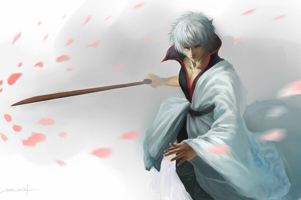 Anime ragazzo con la spada in mano seziona l aria su uno sfondo di petali rosa