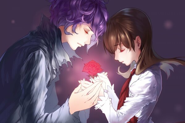 Chłopak i dziewczyna naprzeciwko siebie trzymają się za ręce i z różą w dłoniach