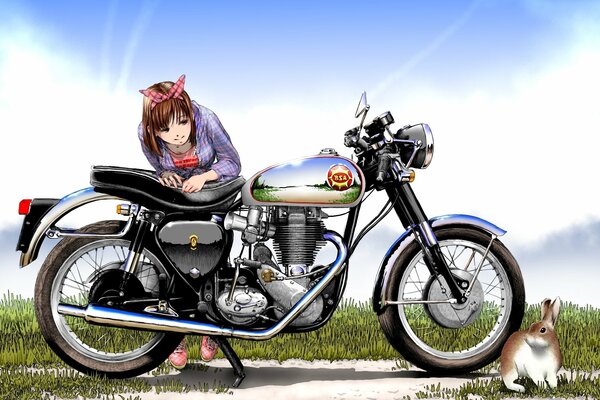 A girl with a motorcycle. A hare on the road