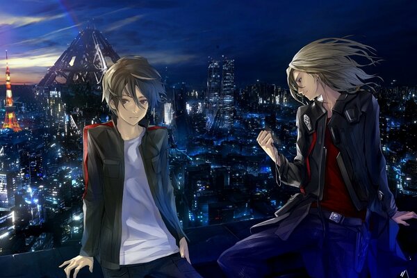 Due ragazzi sullo sfondo della città di notte