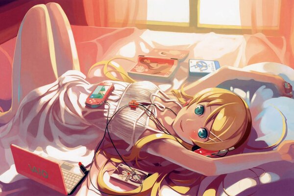 Anime girl is lying with a laptop