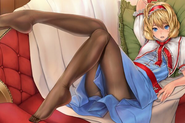 Anime girl in stockings on a red sofa