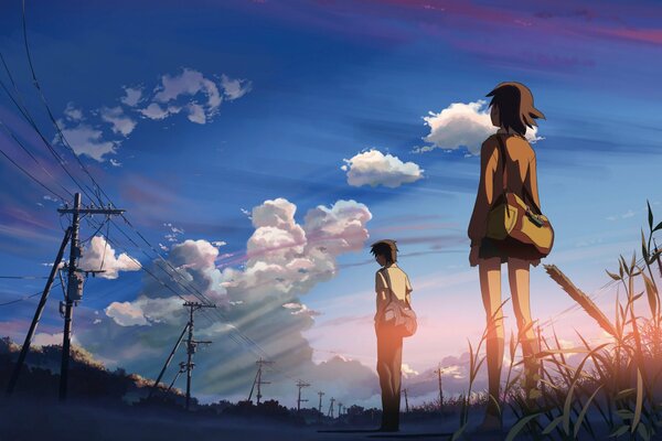 Makoto Shinkai se para en el camino con una chica y Mira al cielo