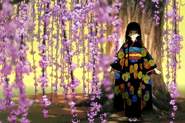 A girl in a kimono on a background of cherry blossoms