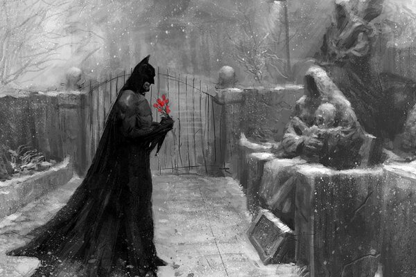 Batman ha portato un mazzo di fiori sulla tomba della madre con il bambino