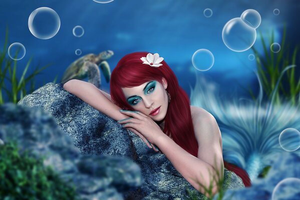 Sirena melancólica en el fondo del océano