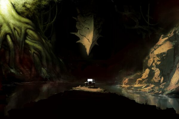 A computer in a cave against the background of a dragon