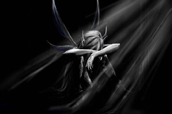 A winged elf sits in the dark