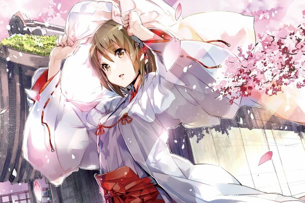 Art Girl con ropa que se desarrolla a partir del viento en el fondo de una ramita de Sakura