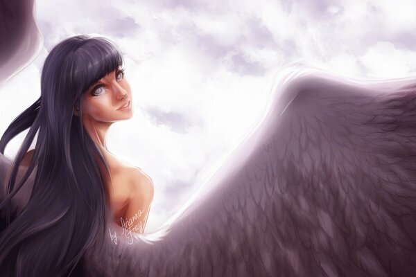 Dziewczyna anioł z ogromnymi skrzydłami