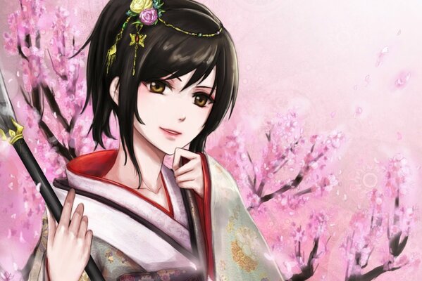 A girl in a kimono among the sakura