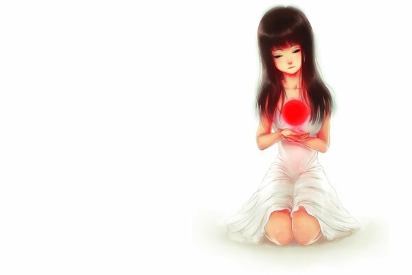 A girl in a white dress holds a red ball