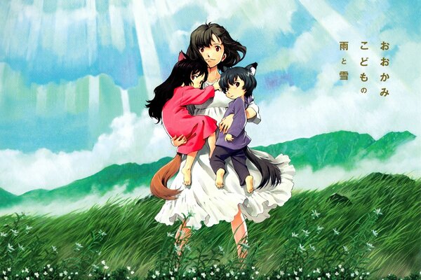 Dziewczyna z chłopcem i dziewczynką w ramionach na zielonym polu pod chmurami