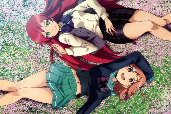 Anime: young schoolgirls on a carpet of flowers