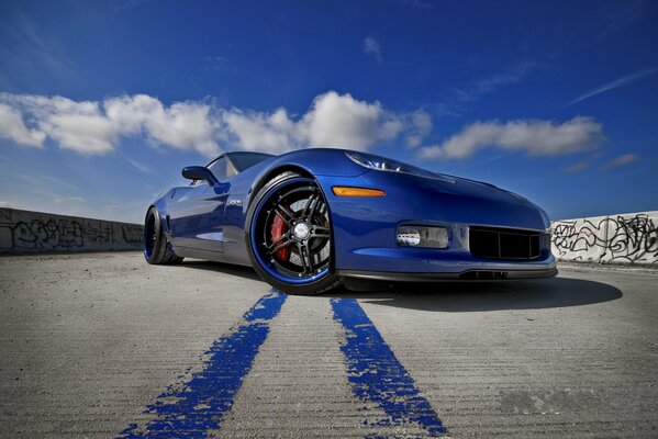 Blue Chevrolet z06 against the sky