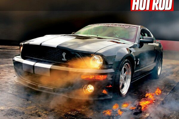 Mustang shelby gt500, светит огненными фарами. Дым