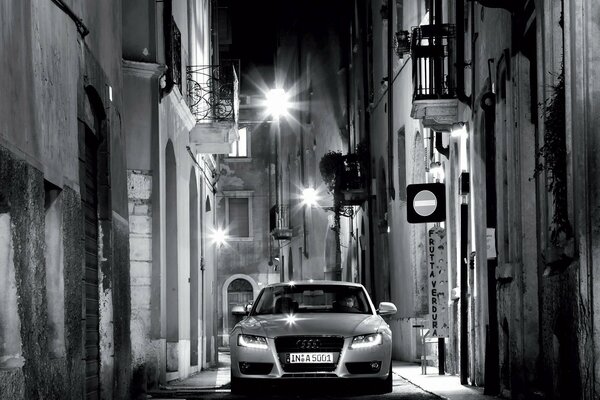 A car on the background of a night street