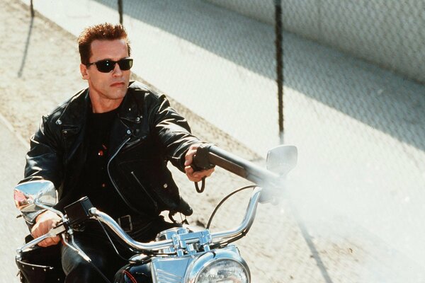 Terminator on a motorcycle in a leather jacket and glasses