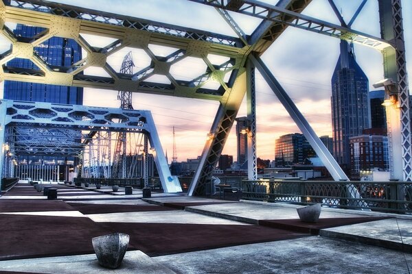 Snow-covered pedestrian bridge at sunset in Nashville Tennessee