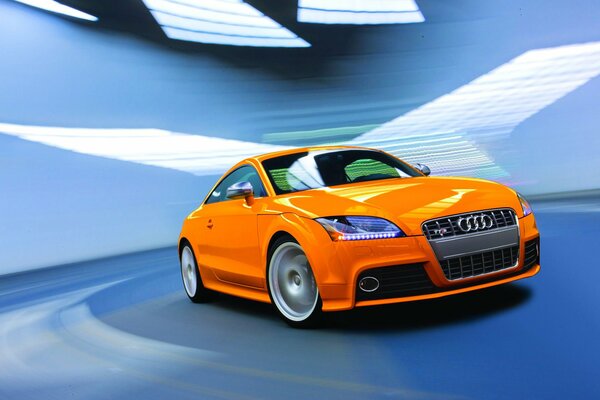 Orange audi on a light blue background