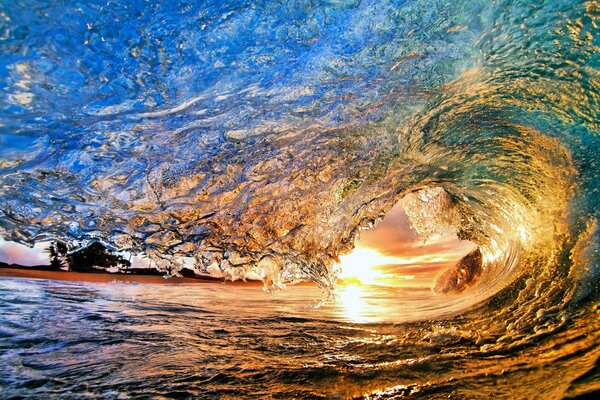 Swirling wave on the background of sunset