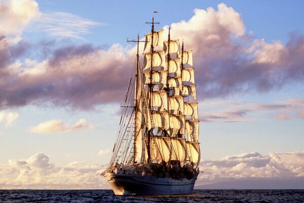 The sails of the ship, blown by the sea wind