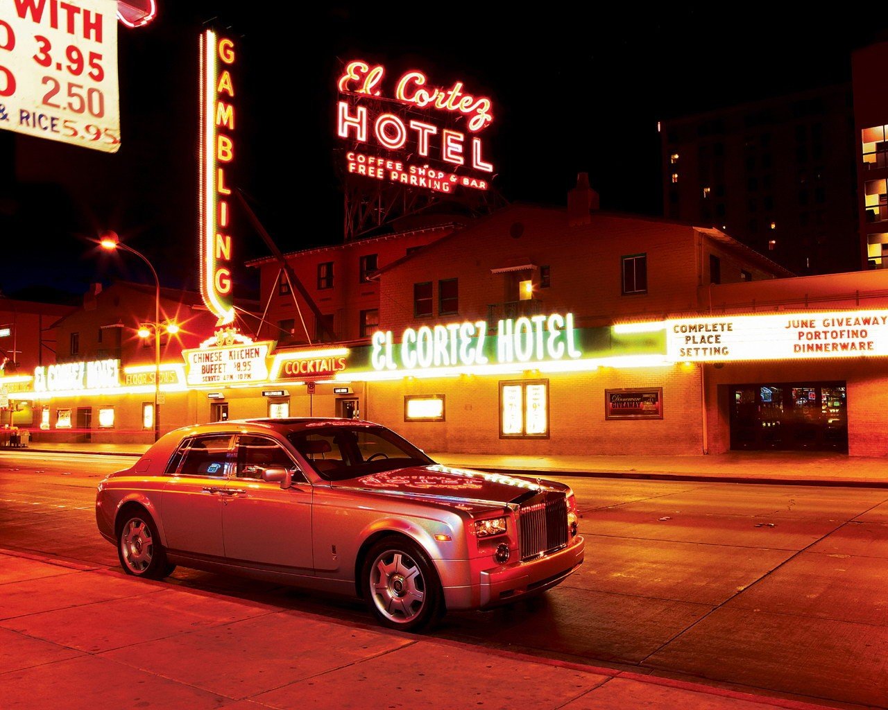 rolls-royce phantom neon advertising night