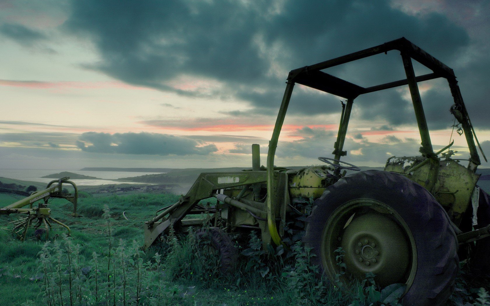 tractor grass abandoned broken