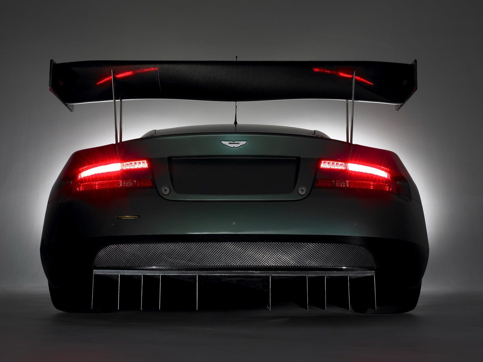 aston martin dbr9 phares aile