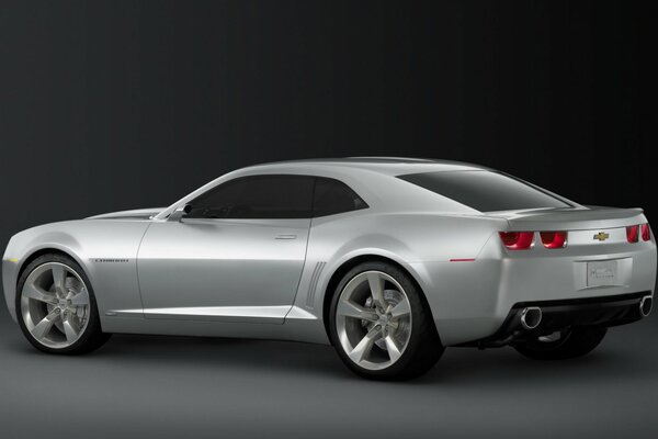 Silver Chevrolet camaro on a neutral background