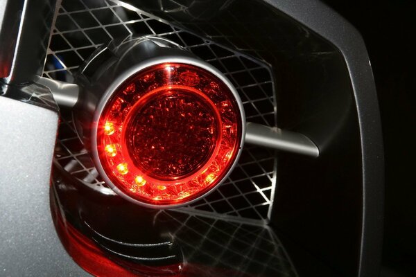 Luminous car headlight with mesh