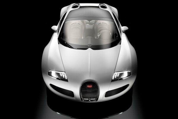 White bugatti on a black background