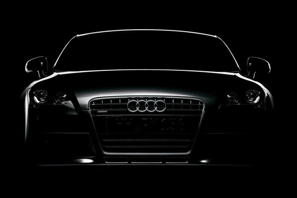 Outline of a black Audi