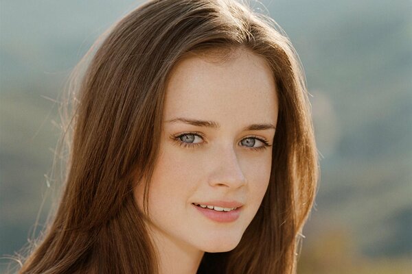 Smiling famous movie actress Alexis Bledel