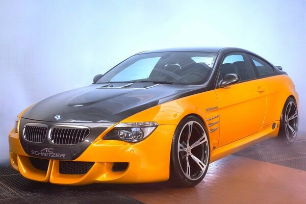 BMW orange body black hood