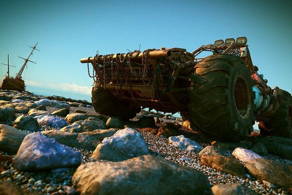 View of the front wheel of an SUV standing on rocks with a boat in the background