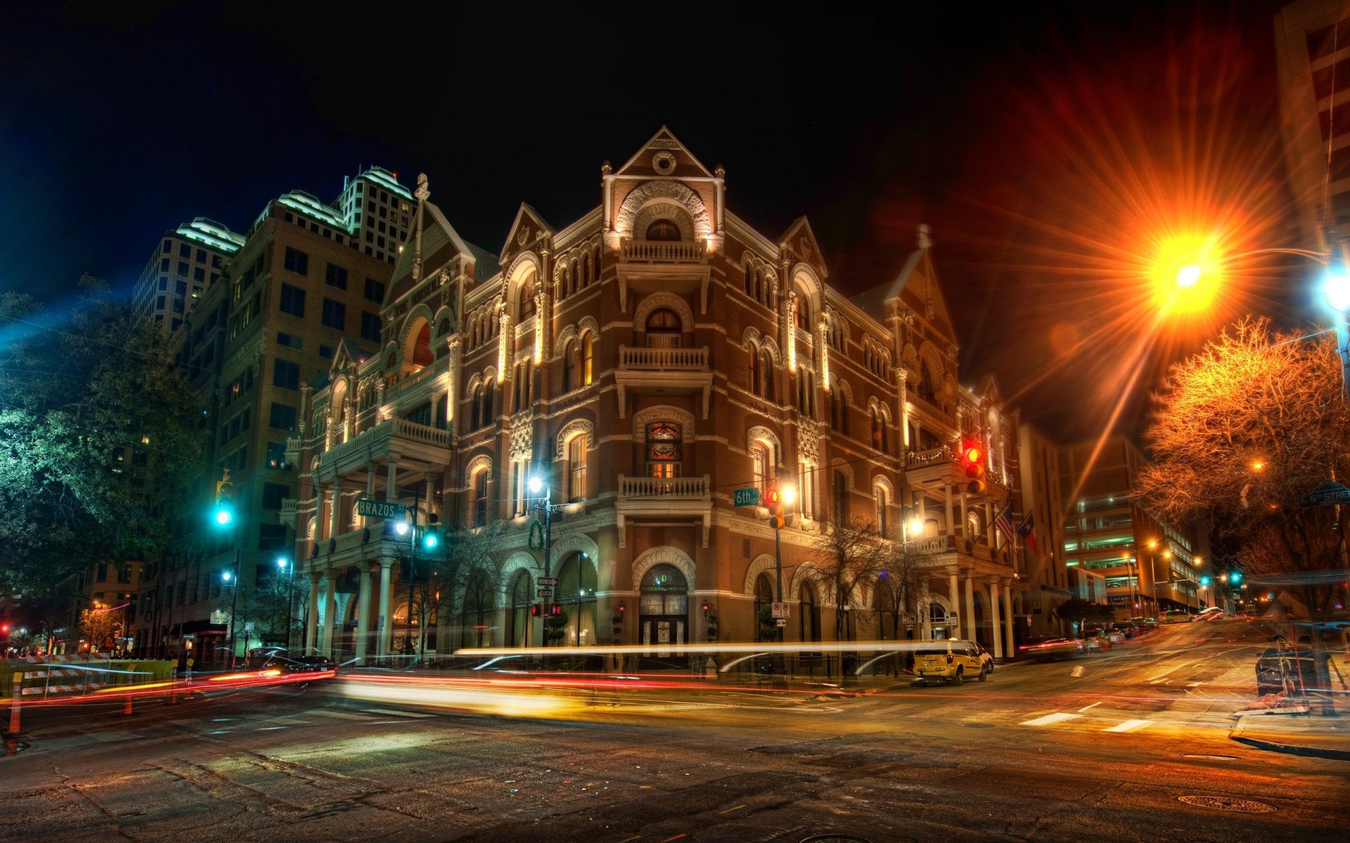 the driskill at night austin night road buildings light