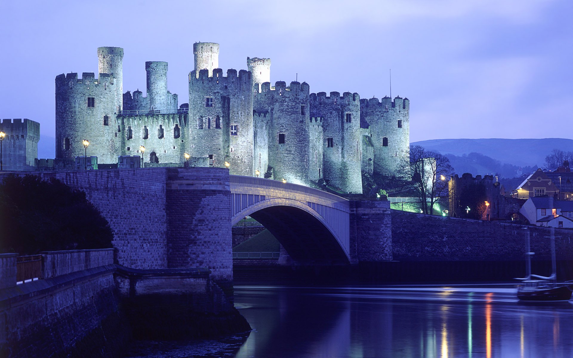 château soirée lumières eau pont