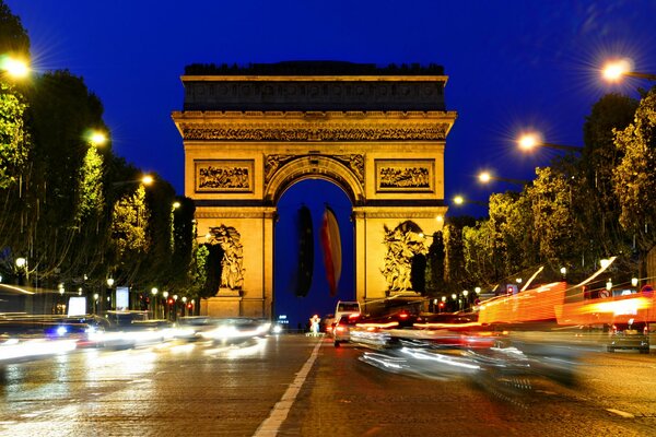 View of the Champs-Elysees in the night lighting of the city