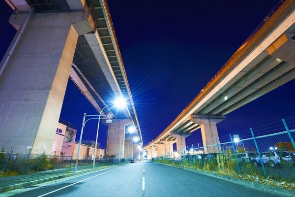 Night road along bridges Japan