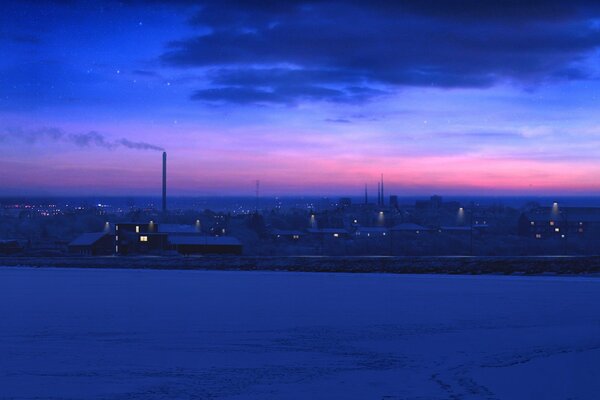Зимний закат в городе с заводами