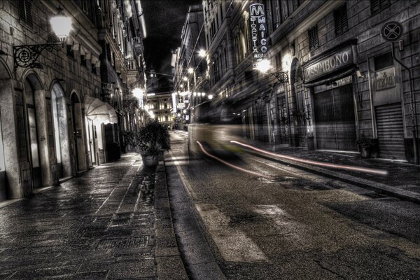 An empty night street with a lantern