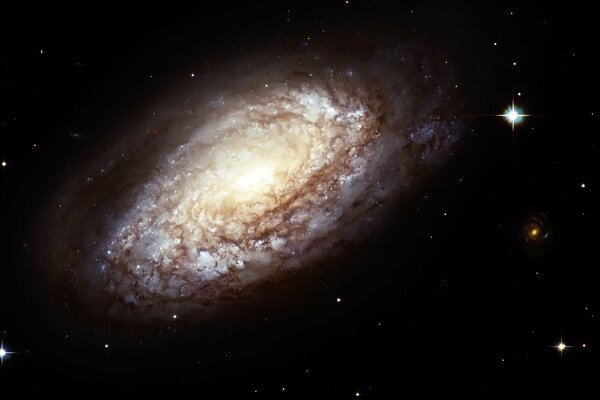 A picture of a galaxy with stars using a telescope