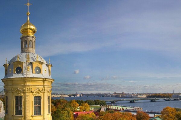 View of the church tower and bridge in autumn Petersburg