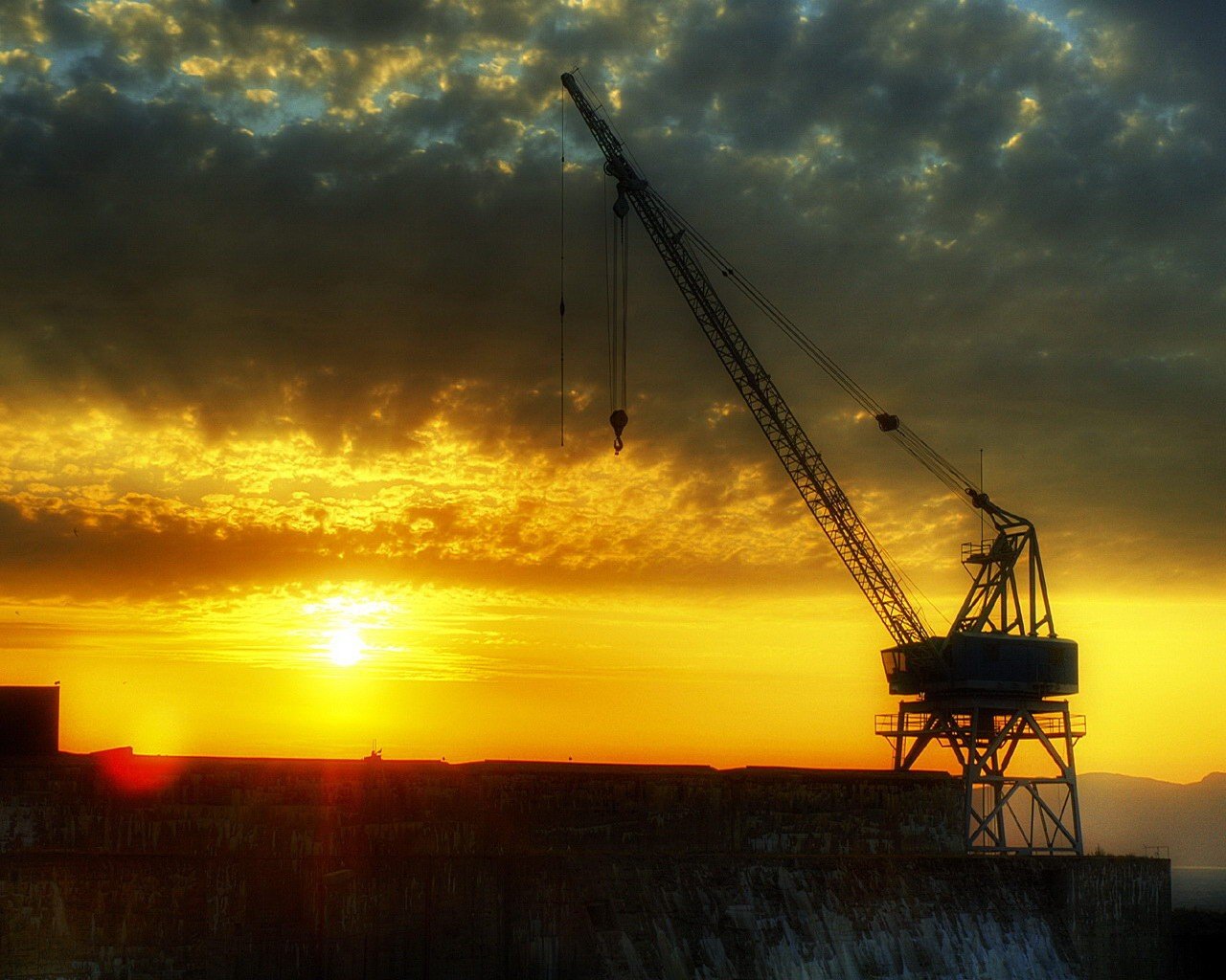 clouds crane sunset