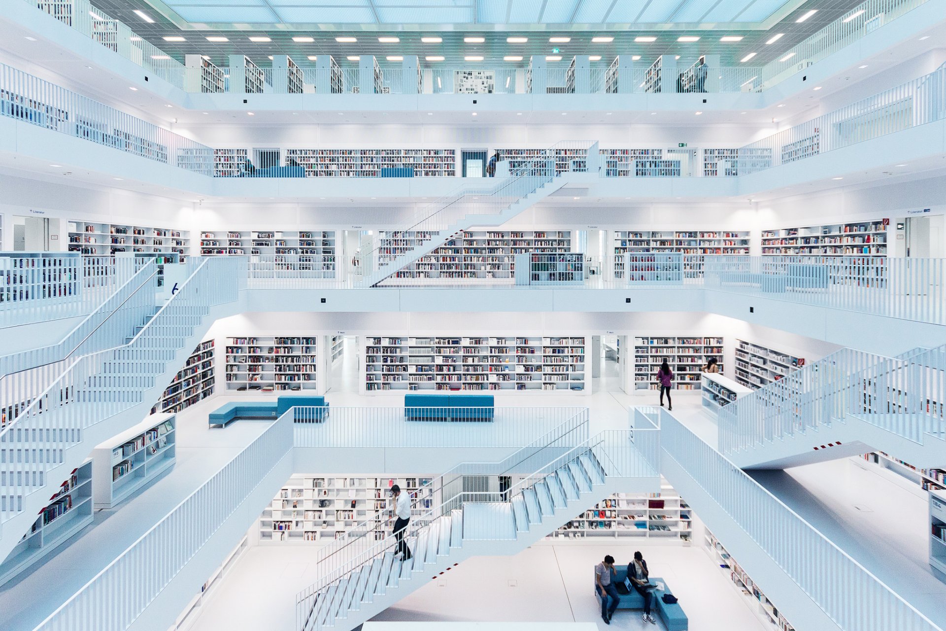 library books ladder people sofa